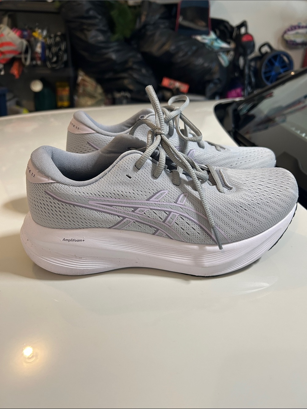 ASICS Women's Light Gray Athletic Running Shoes with Pale Lavender Accents